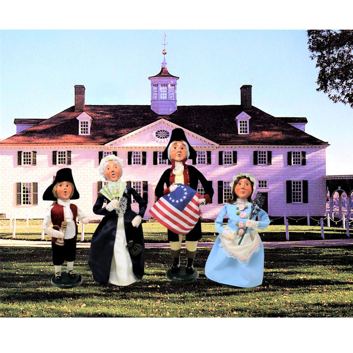 Nelly Caroler with Lavender - Limited Edition from Byers' Choice - BYER'S CHOICE, LTD - The Shops at Mount Vernon