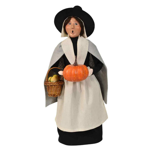 Byers’ Choice Pilgrim Woman 2026 figurine holding a pumpkin