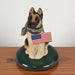 Byers’ Choice German Shepherd Dog with Flag - The Shops at Mount Vernon