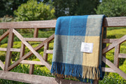 Blue and Gold Tartan Blanket On Bench