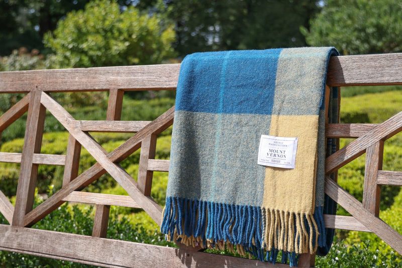 Blue and Gold Tartan Blanket On Bench